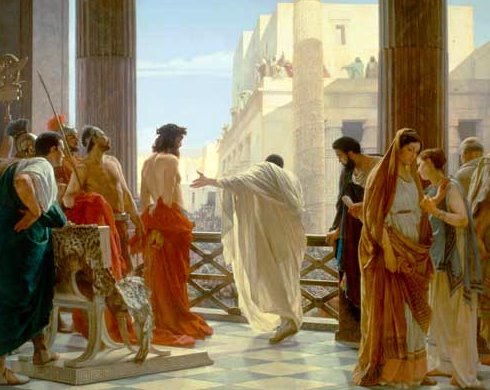 Pilate says to the crowd, "Behold the man!"
